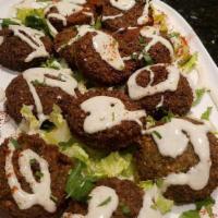 Falafel Platter · Finely ground chickpeas, onion, garlic and spices.