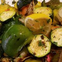 Grilled Vegetable Salad · Eggplant, squash, onion, green pepper over lettuce, tomato and cucumber.