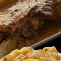 Fried Chicken Gone Wild Sliders
 · Cheddar, smoked bacon, homemade buttermilk biscuits, white sausage gravy