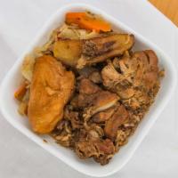 Brown Stew Chicken · Serves with rice, plantain  and dumpling