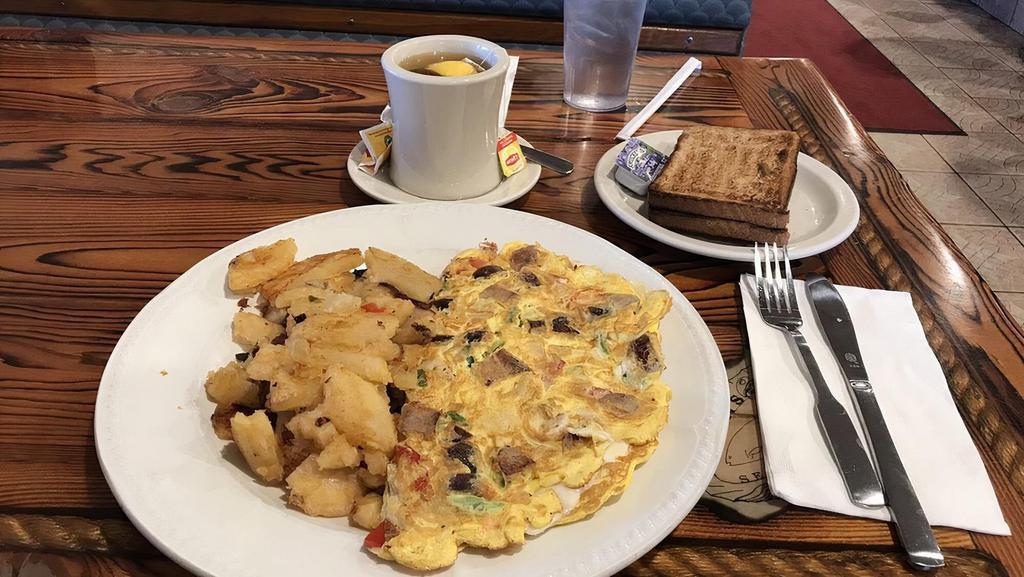Italian Omelette · Three eggs. Served with sausage, peppers, onions and mozzarella. Served with home fries and toast.