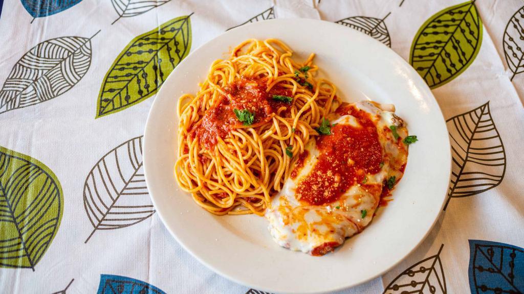 Chicken Parmigiana Plate · Served over choice of pasta with soup or salad in homemade tomato sauce. Topped with mozzarella cheese.