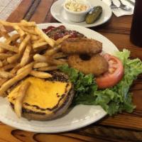 Turkey Burger · Served with coleslaw and pickles. Make it a deluxe with french fries, onion rings, lettuce a...