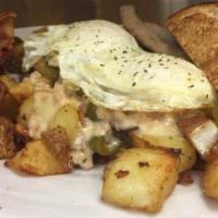 Breakfast Plate · Loaded homefries (peppers and onions) smothered with homemade sausage gravy topped with two ...