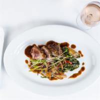 Herb Crusted Rack Of Lamb · Truffle parmesan fingerling potatoes, sautéed broccoli rabe, red wine reduction