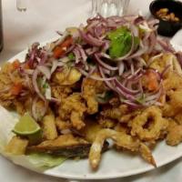 Jalea · Assorted deep fried seafood and fish accompanied with fried cassava and salsa criollo.