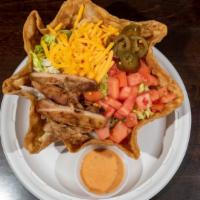 Grilled Chicken Tostada Salad · Salad with deep fried tortilla and grilled chicken.