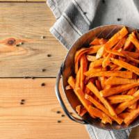 Sweet Potato Fries · Wedges of sweet potatoes, tossed with oil, sprinkled with spices, and baked on high heat unt...