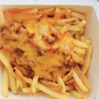 Chili Cheese Fries · Crispy, craveable fries with nacho cheese, chili and cheddar cheese.