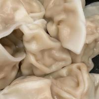 Steamed Dumplings Pork · 8 pieces.