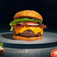 Back To Bacon Burger · American beef patty topped with melted cheese, layers of crispy bacon, lettuce, tomato, onio...