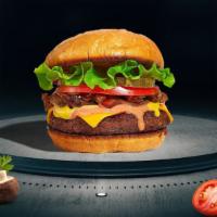 Classic Thrill Burger · American beef patty topped with lettuce, tomato, onion, and pickles on a bun.