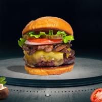 Meta Mushroom Burger · American beef patty topped with mushrooms, melted cheese, lettuce, tomato, onion, and pickle...