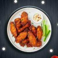 Classic Wings · Fresh chicken wings breaded and fried until golden brown. Served with a side of ranch.