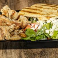 Chicken Kabobs · Chunks of marinated chicken, chargrilled on a skewer, served either in a pita with lettuce, ...