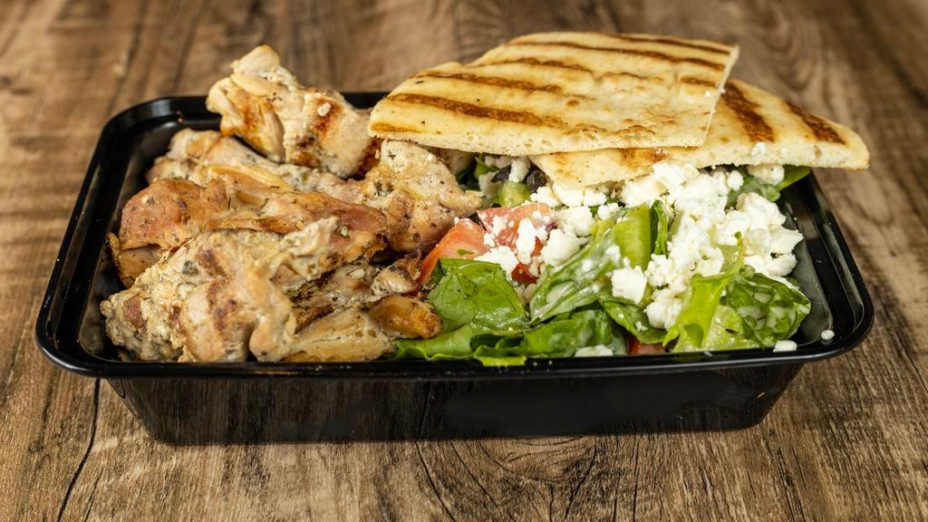 Chicken Kabobs · Chunks of marinated chicken, chargrilled on a skewer, served either in a pita with lettuce, tomato, onions and tzatziki sauce, or on a platter with a side order of Greek salad, pita triangles and tzatziki sauce.