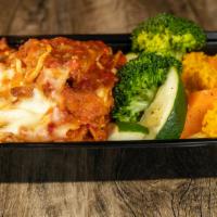 Platter Chicken Parmigiana · Lightly breaded, boneless breast of chicken cutlets, topped with tomato sauce, Romano and mo...