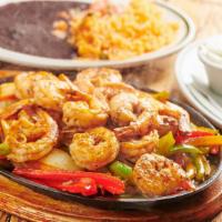 Shrimp Fajitas · Sauteed Peppers, and Onions with Guacamole, Sour cream, served with rice and black beans