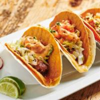 Beef Crunch Tacos · Hard Shell Taco wrapped with a soft shell tortilla with tomato, lettuce, chipotle ranch, and...