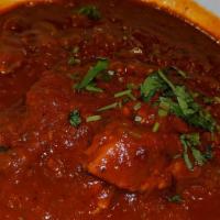 Vindaloo · Goa’s gift to the world. Curry infused with Kashmiri chilly peppers, garlic. Spices and vine...