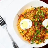 Biryani · The flavorful combination of meat, shrimp or egg and basmati rice cooked together with saffr...