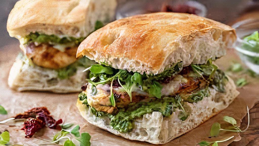 Chicken Pesto Melt · Griddled sandwich with melted mozzarella cheese, grilled chicken, pesto, tomato, on your choice of bread.