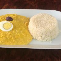 Aji De Gallina · Chicken Strips & Boiled Potatoes Mixed On A Creamy Yellow Sauce. Served With Rice.
