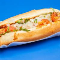 Taco · Hot dog topped with your choice Mild or Hot chili, cheese, lettuce, tomato and raw onion.