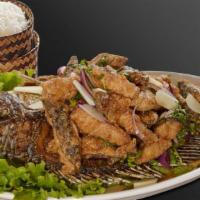 Crispy Fish Larb Salad · Fried whole tilapia with mint, shallots, scallions, cilantros, and toasted rice powder with ...