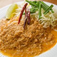 Mee Ka Ti · Medium spicy. Contains nuts. Rice noodle with coconut peanut curry, ground pork, egg, onions...