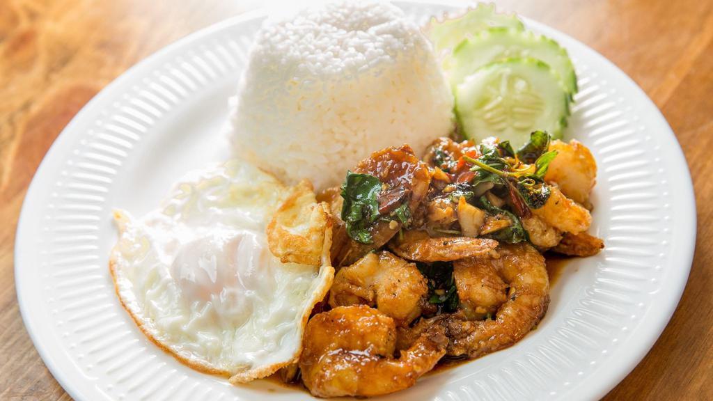 Pad Ka Prow · Basil sauce with ground meat, holy basil, garlic, and chili served over rice and fried egg on top. Ask for spicy!