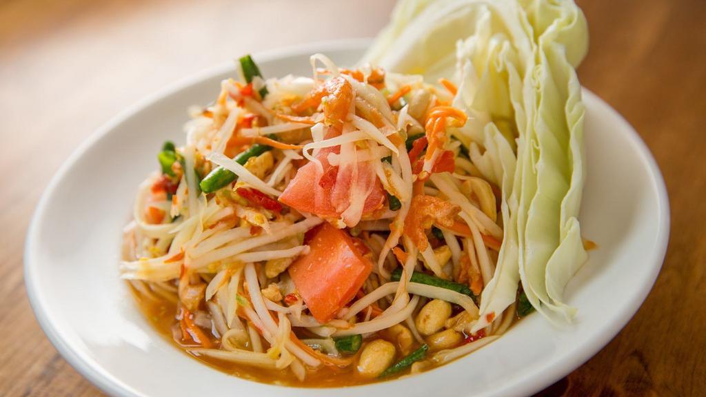 Tum Thai Kai Kem · Papaya salad with peanuts, dried shrimps, and salty egg.