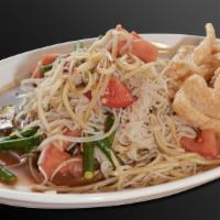Tum Sua · Papaya salad with vermicelli noodle, pickled fish sauce, and crispy pork skin. (Fishy)