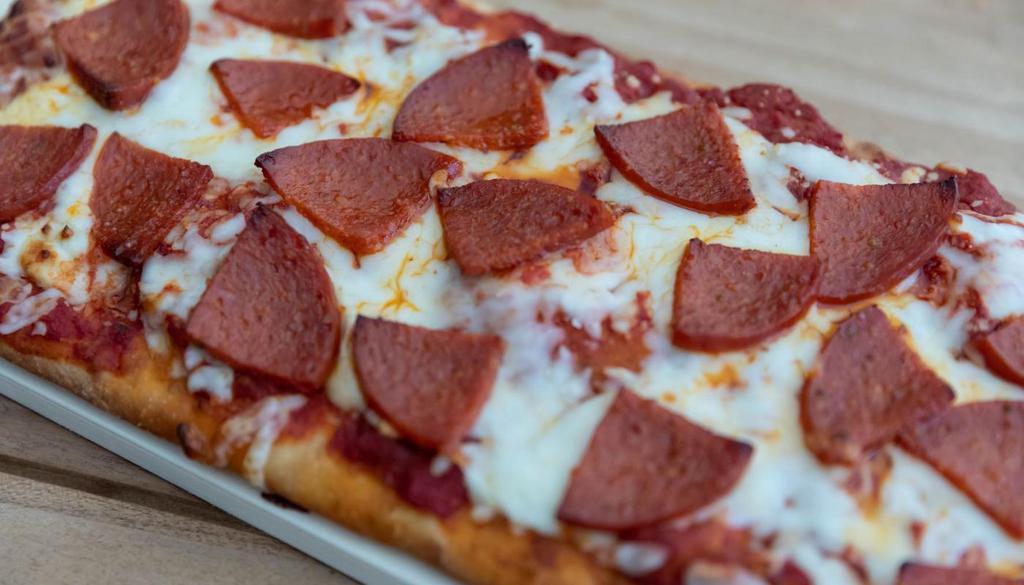 Tuscan Style Pepperoni Pizza · A base of our tangy marinara sauce topped with shredded mozzarella and smoky sliced pepperoni. Serves 2-4.