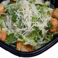 Caesar · crisp romaine lettuce tossed with seasoned croutones, grated parmesan cheese and classic cae...