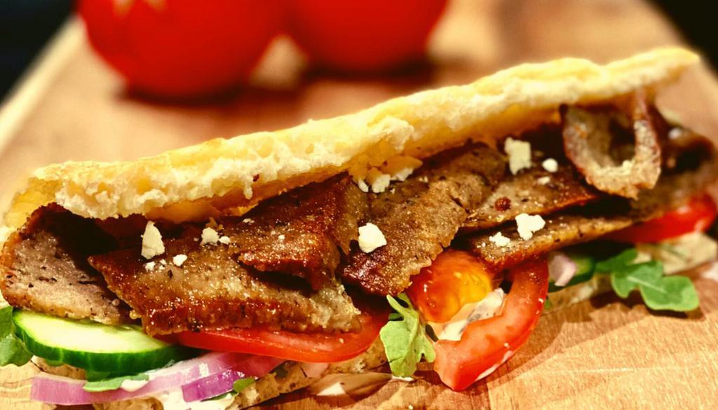 Gyro Sandwich · Lamb, Feta, Cucumber, Tomato, Red Onion, Arugula, Tzatziki Sauce