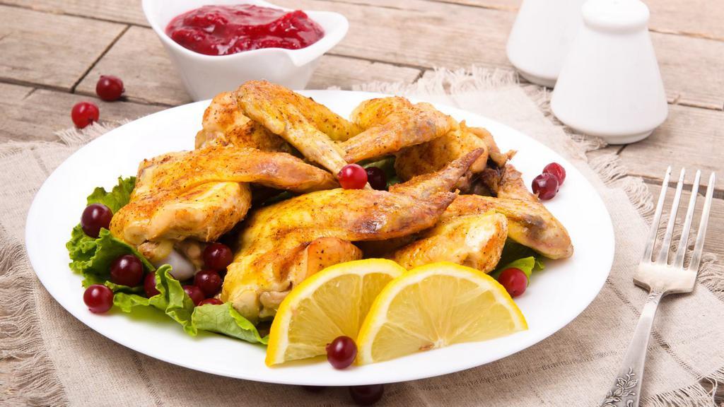 Chicken Wings (5 Pcs) · Crispy, golden fried chicken wings.