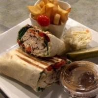 Europa Chicken Wrap · With spinach, roasted peppers, fresh mozzarella and Italian dressing on sundried tomato wrap.