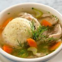 Matzo Ball Soup · Our traditional recipe includes chicken broth made from scratch, vegetables and handmade mat...