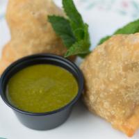 Vegetable Samosa (2) · Vegan. Crispy fried triangular patties stuffed with our special potato, pea & cauliflower fi...