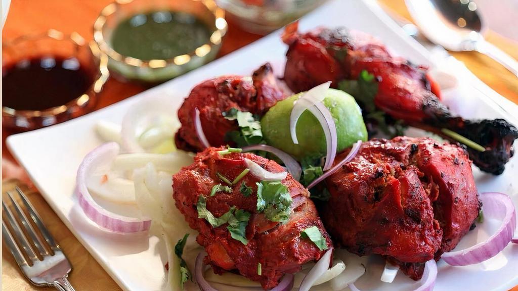 Chicken Tikka · Chicken breast marinated with spices & yogurt and grilled in our clay oven.