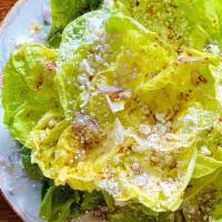 Insalata Gilda · baby butter lettuce with avocado, goat cheese, shallot in mustard vinaigrette