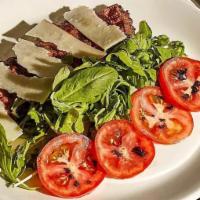 Steak Tagliata · steak, arugula, beefsteak tomatoes, balsamic, parmigiano