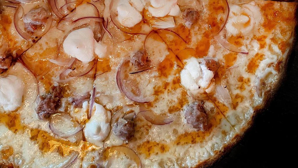The White Pie · mozzarella, ricotta, sausage, red onion, side of hot honey