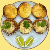 Masala Pav Bhaji Sliders (3) · India's street dish. Masala mashed potato & vegetable medley, pickled jalapenos, parmesan, b...