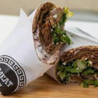 Lamb/ Beef  Toasted Wrap · Lamb/Beef gyro in a toasted whole wheat wrap with tomatoes, onions, lettuce , crumbled feta ...