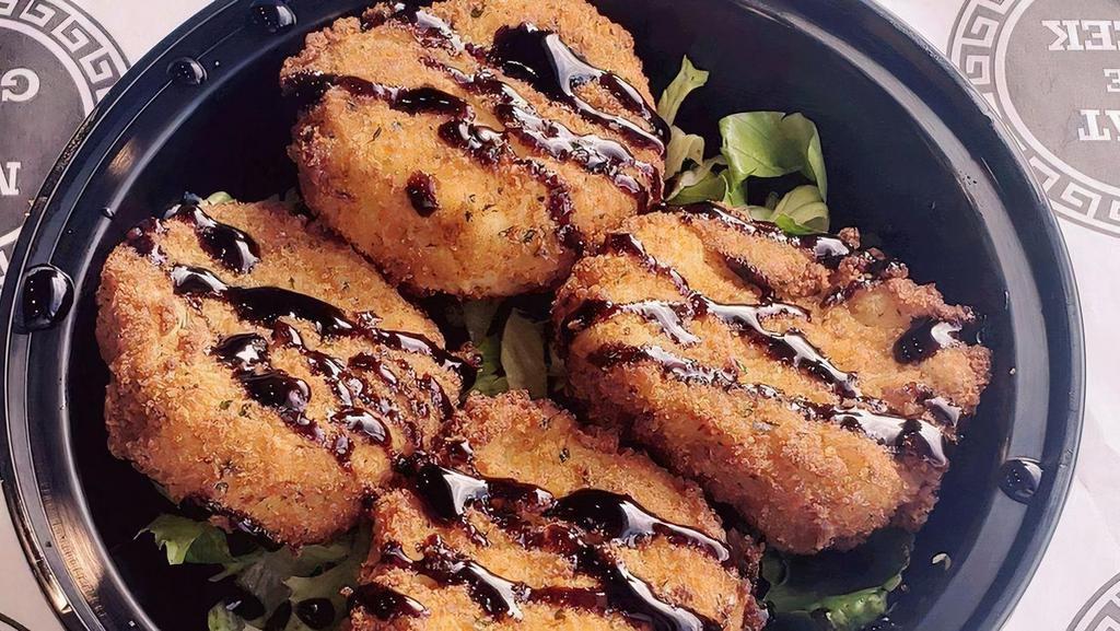 Fried Goat Cheese · Fried goat cheese drizzled with a balsamic glaze