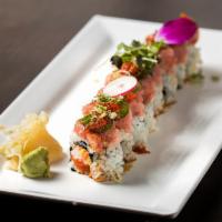 Red Diamond Roll* · Spicy Crunchy Tuna, Avocado & Mango topped with Blue Fin Toro, Jalapenos & Masago. Limited a...