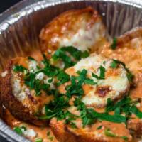Rice Ball Parm Special · With vodka sauce and a scoop of ricotta