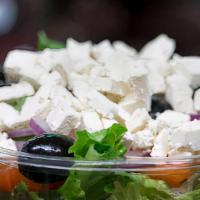 Greek Goddess Salad · Feta cheese, red onion, tomato, and black olives over romaine lettuce with balsamic vinaigre...